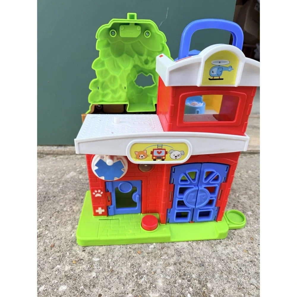 Little People Animal Resuce Adoption Center Vet Hospital Playset by Fisher Price